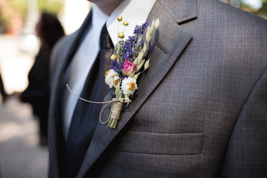 shade to the groom's